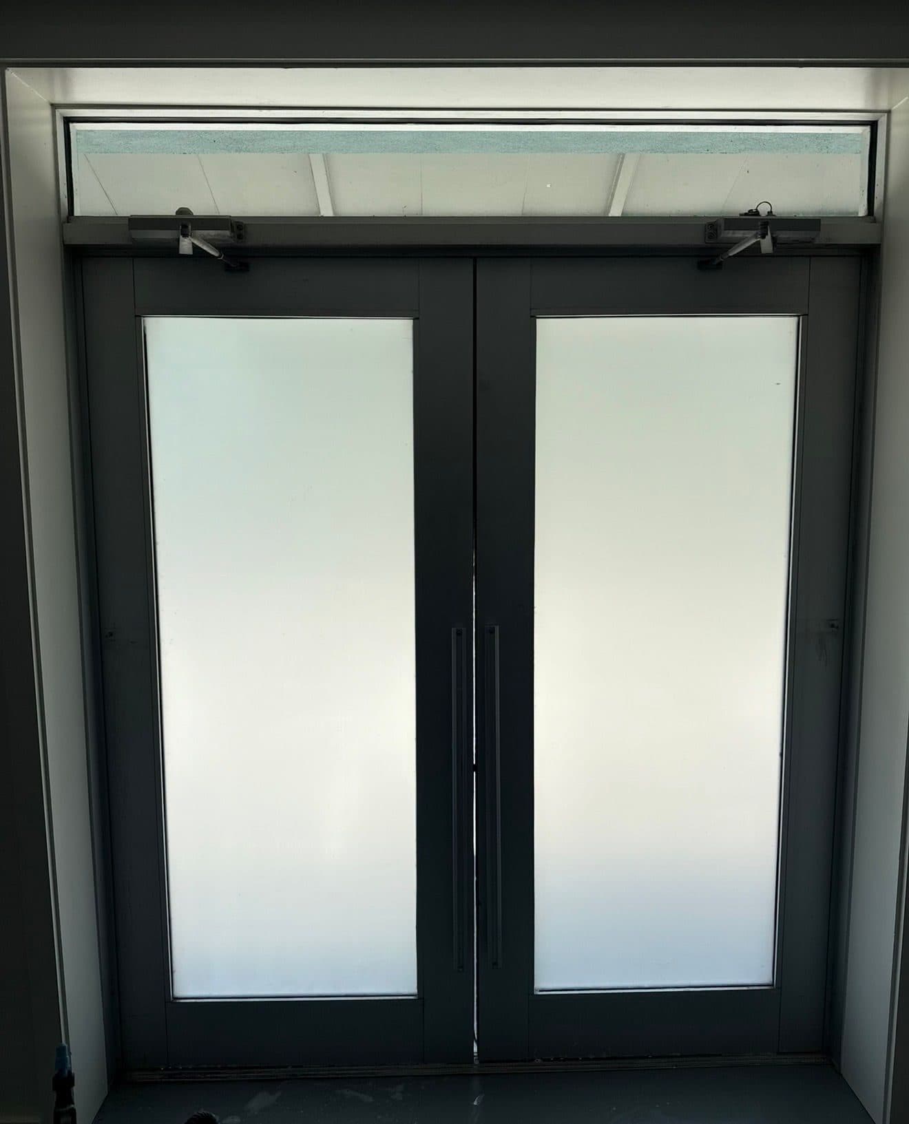 Frosted privacy film on double doors