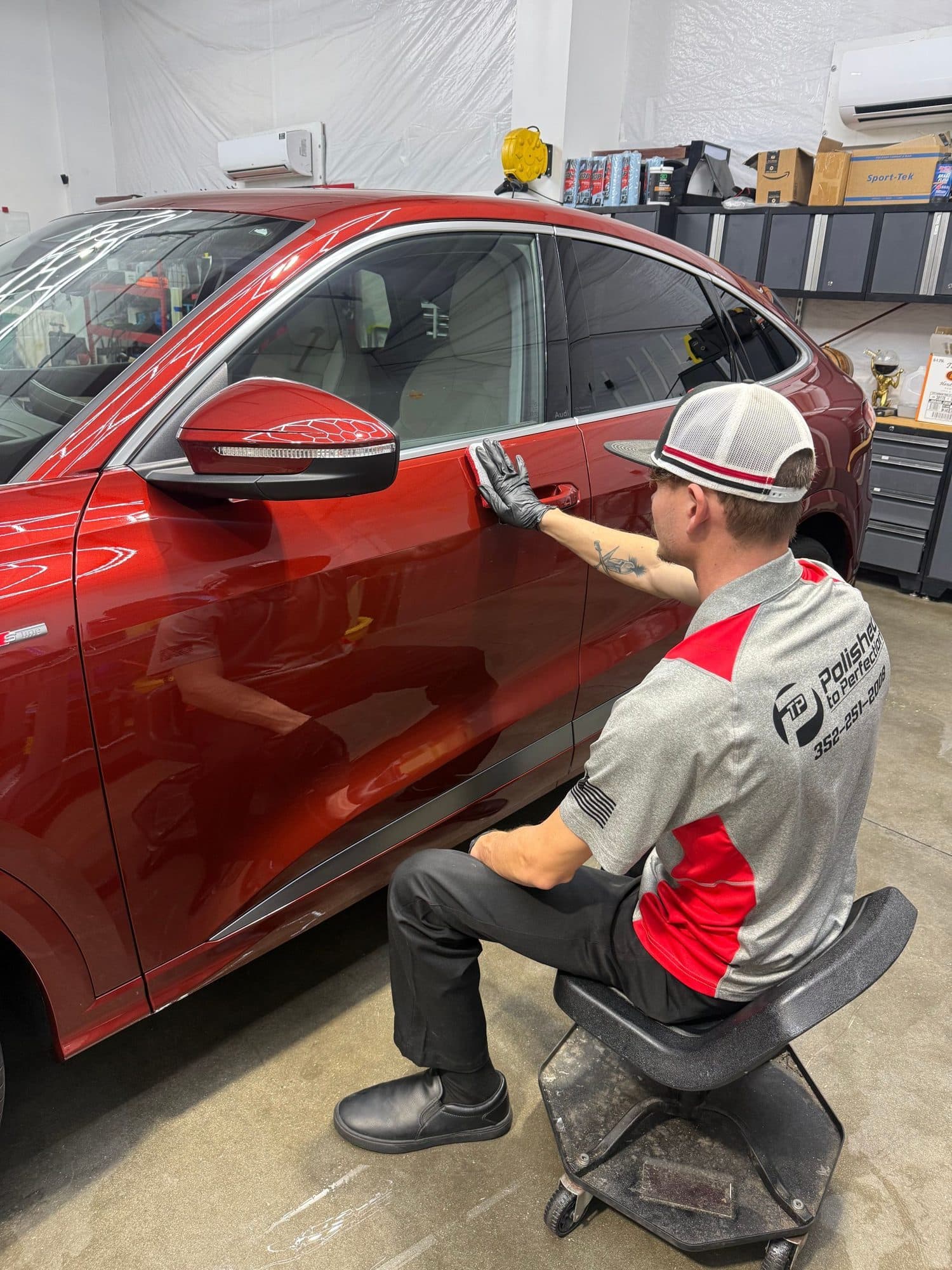 Installer applying paint protection film
