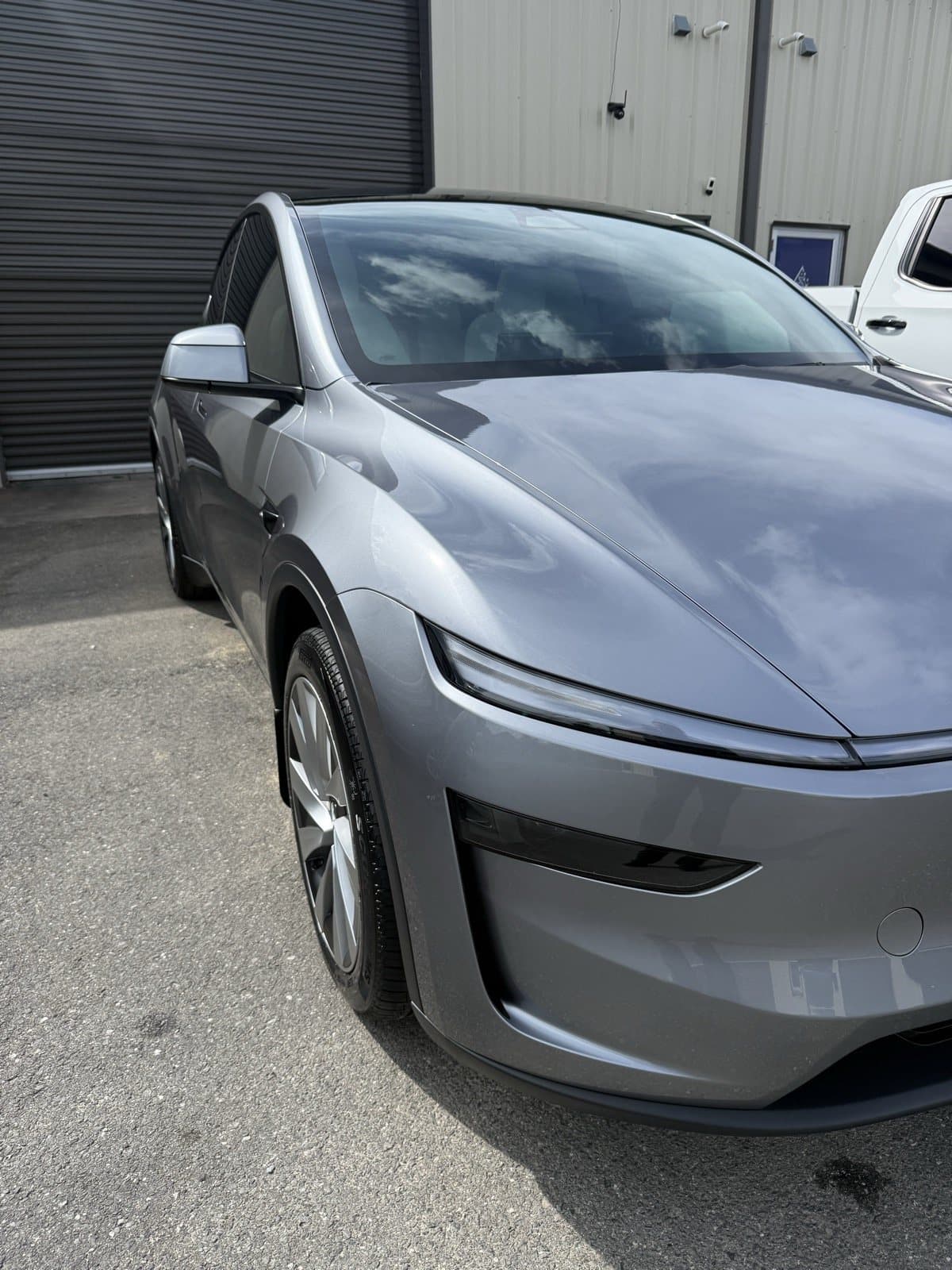 Tesla Model Y with a fresh CARPRO ceramic coating
