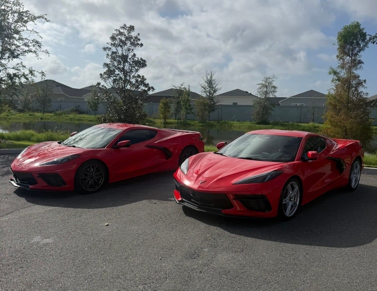Two red Corvette C8s after protection work
